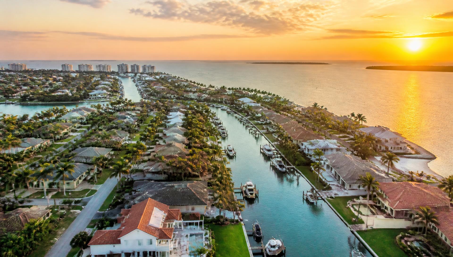 Aerial view of a waterfront Southwest Florida neighborhood at sunset